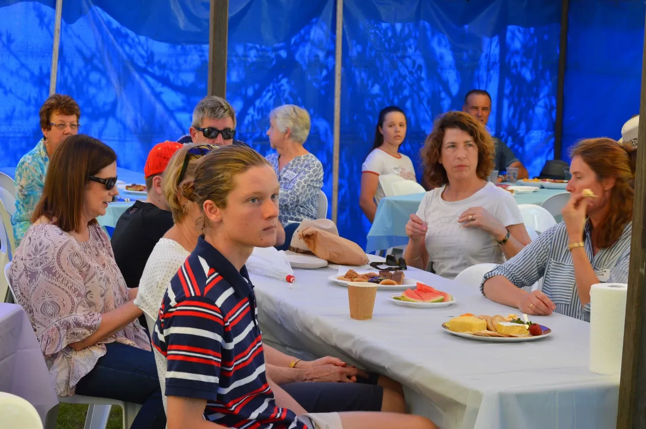 Campbell Family Reunion 2018 — guests with blue aquarium backdrop